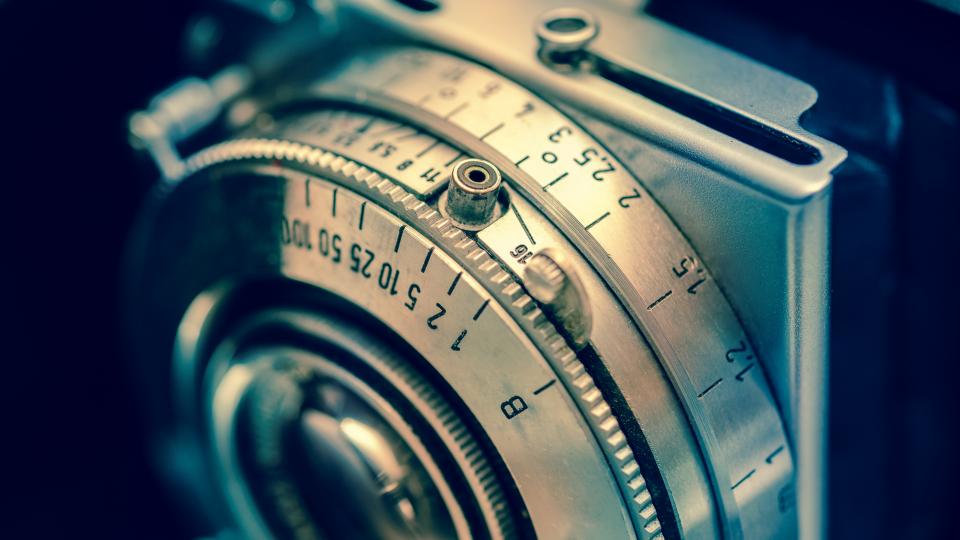 Close up of a vintage camera aperture dial